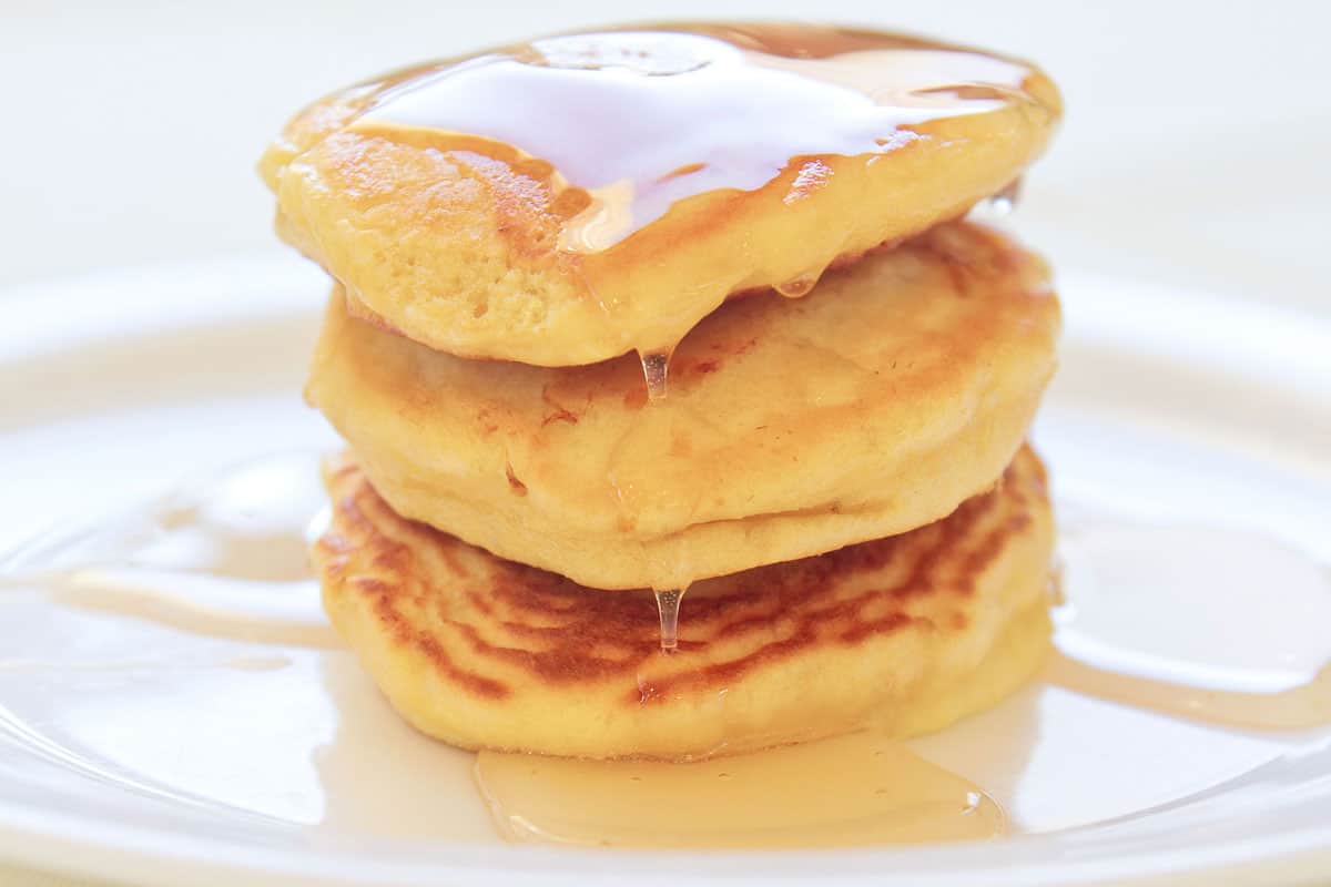 3 Layer fluffy pancake homemade pancake with honey toppings at top