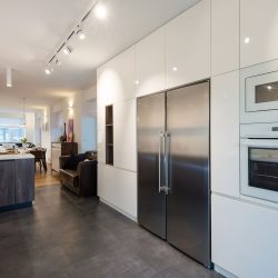 A double door refrigerator with white aluminum paneled cabinets, How Long Can A Refrigerator Stay Unplugged?