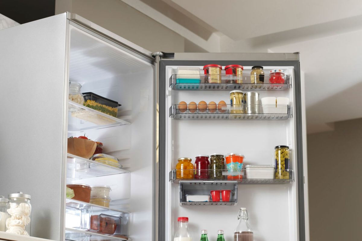 A refrigerator containing lots of food and other essentials