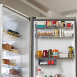 A refrigerator containing lots of food and other essentials, Can A Refrigerator Cool A Room?