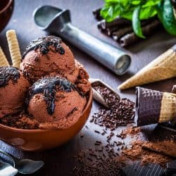 A chocolate ice cream in a glass cup, Freezer Burnt Ice Cream - Can You Still Use It?