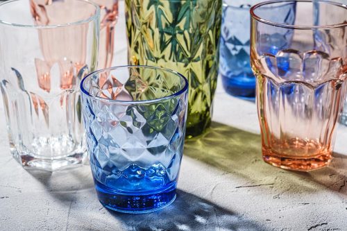 Colorful faceted and geometric drink glass