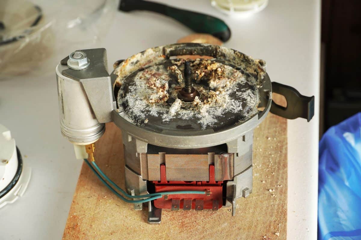 Corroded dishwasher motor due to hardwater deposits