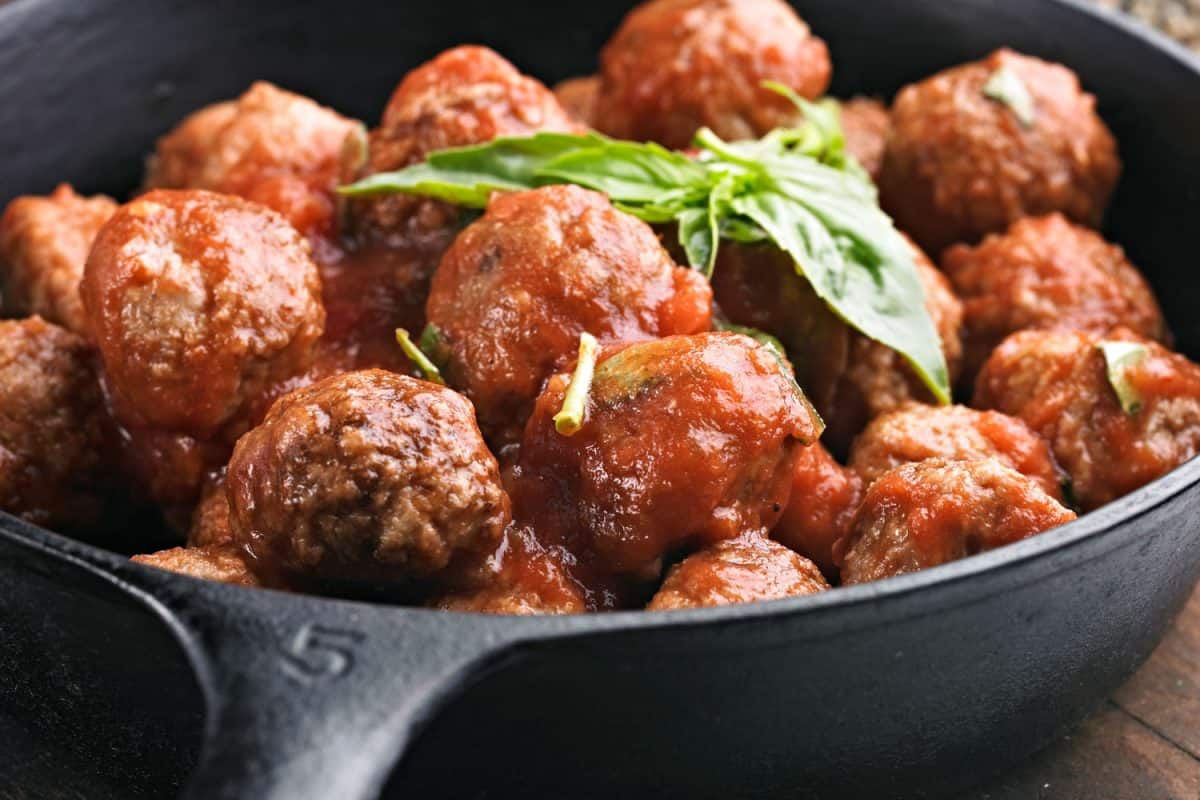 Delicious homemade meatballs garnished with fresh parsley