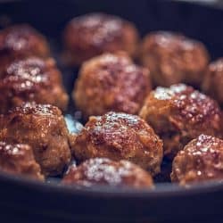 Frying delicious meatballs on the skillet, How Long To Cook Meatballs