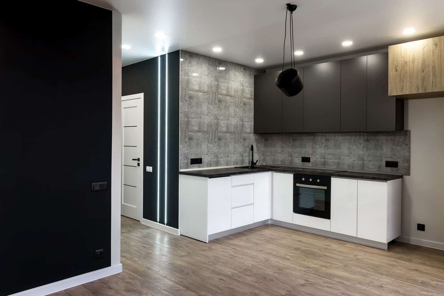 Gray Combination cabinets with black appliances