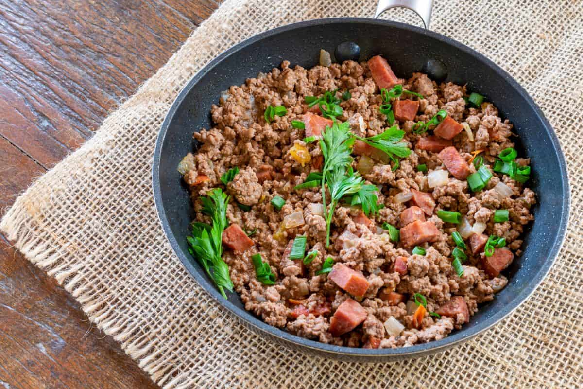 Ground pork mixed with ham and topped with parsley