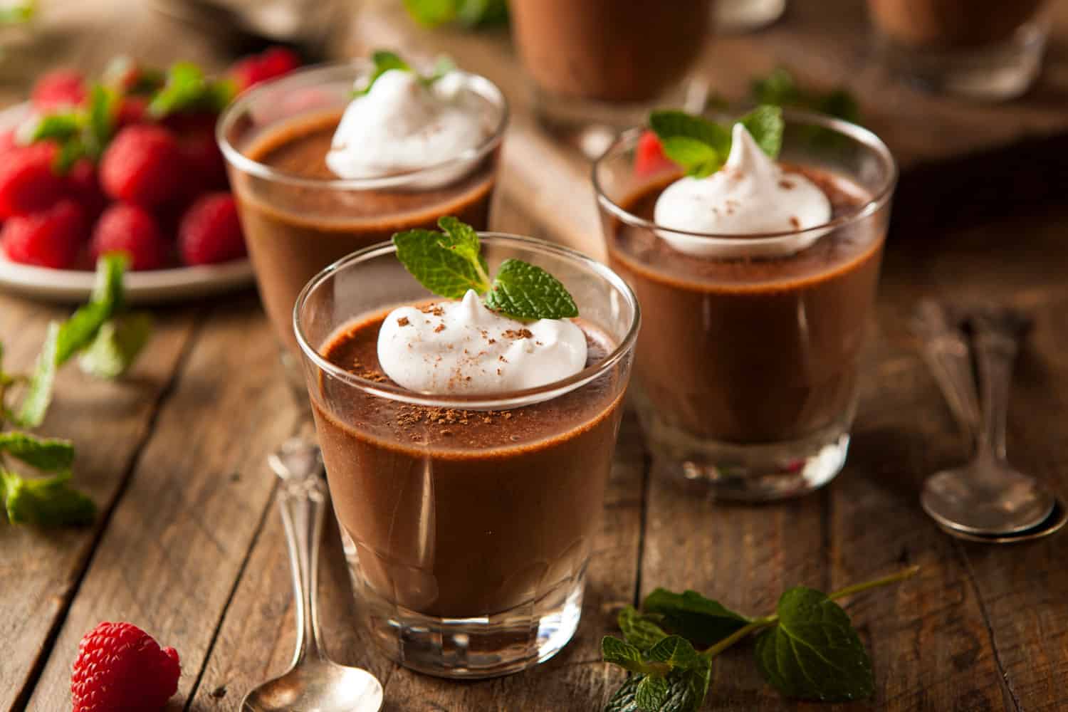 Homemade style of chocolate mousse with whipped cream on top