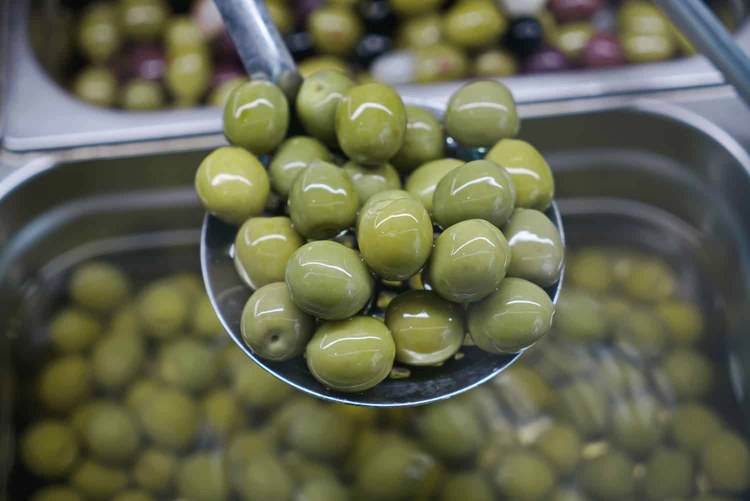 Italian green olives in brine top view