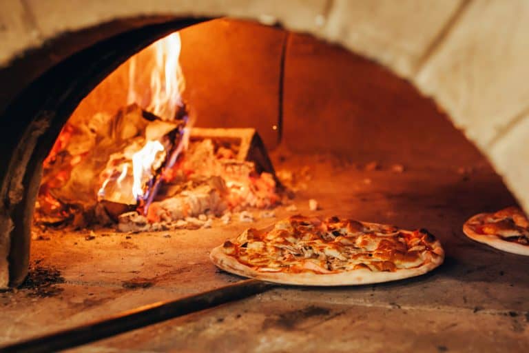 Italian pizza is cooked in a wood-fired oven, Should You Oil A Pizza Stone?