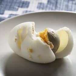 Overcooked Hard Boiled Egg with green or grey tint around the yolk - Can You Leave Boiled Eggs Out Overnight