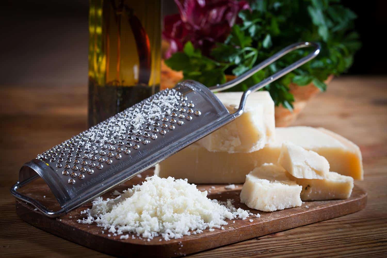 Parmesan cheese with grater