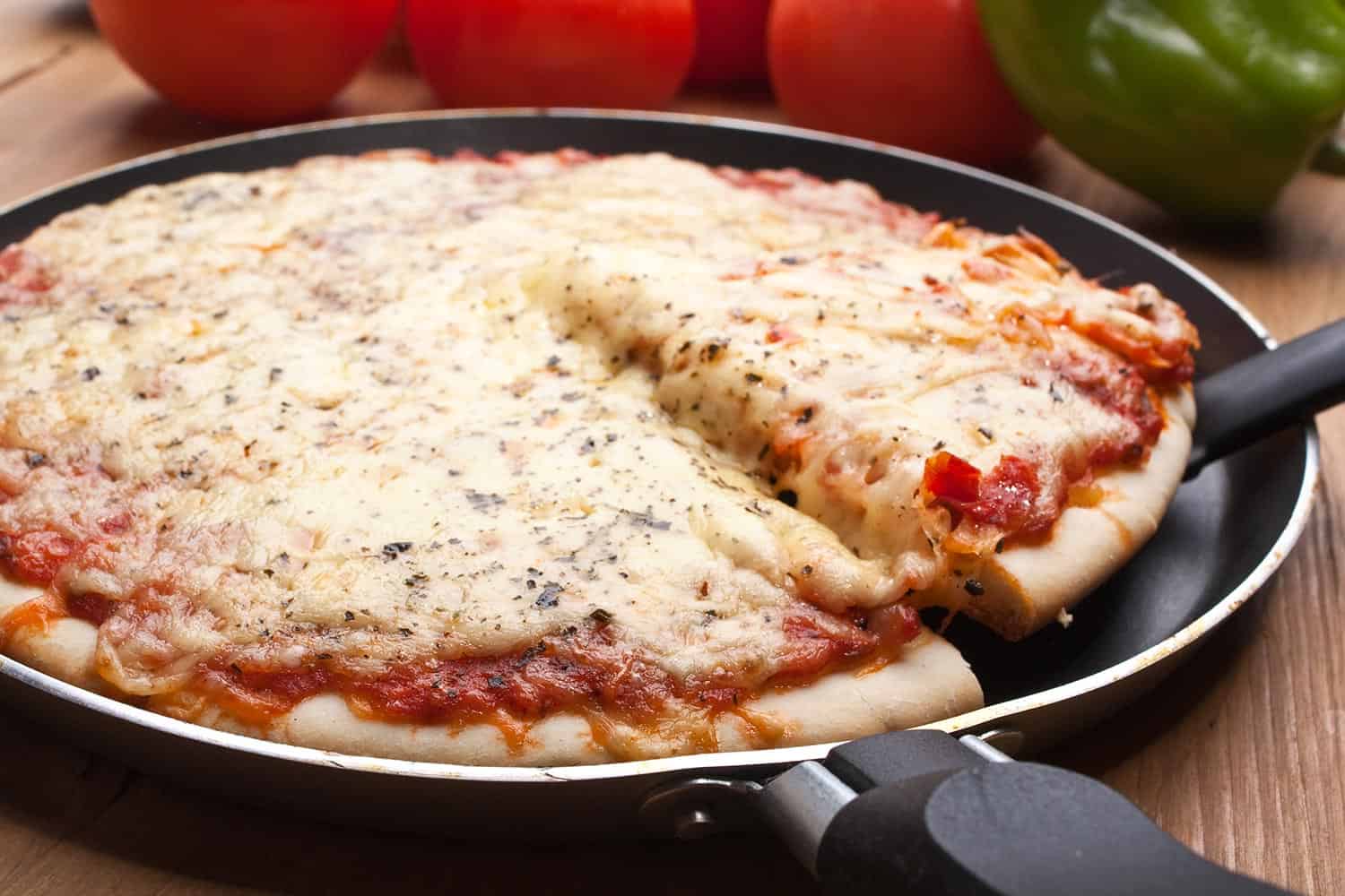 Pizza margarita in a frying pan
