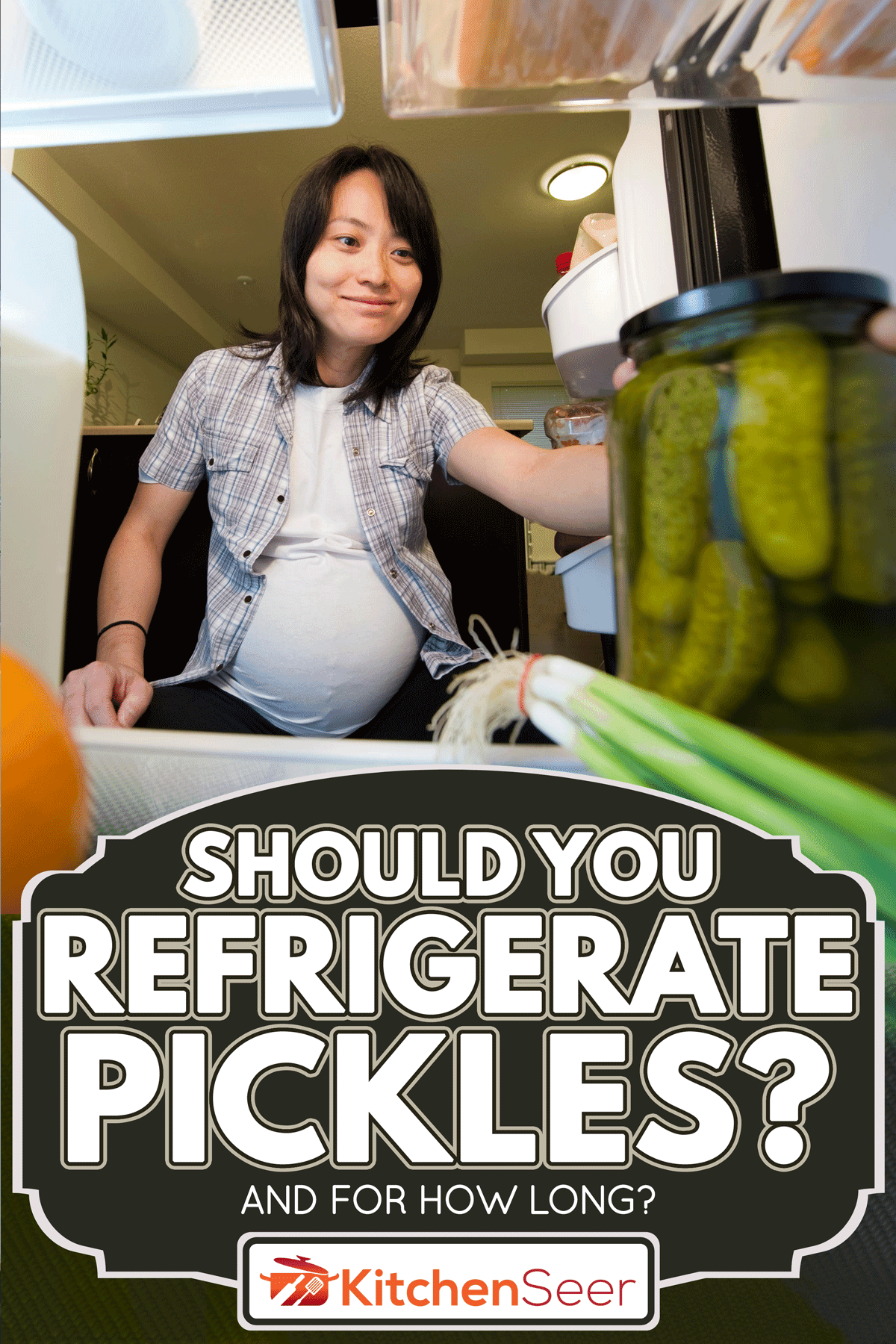 Pregnant woman reaching for a jar of pickles inside a refrigerator, Should You Refrigerate Pickles? [And For How Long?]