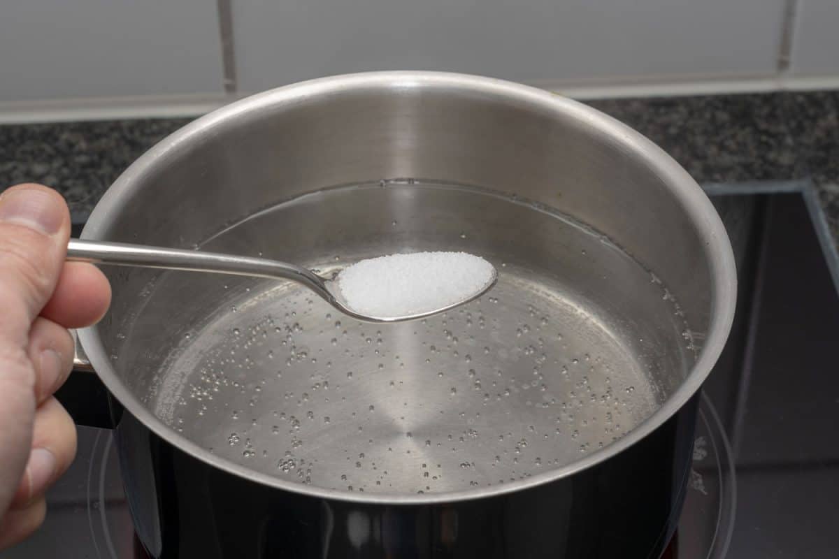 Throwing a spoonful of salt in the pot