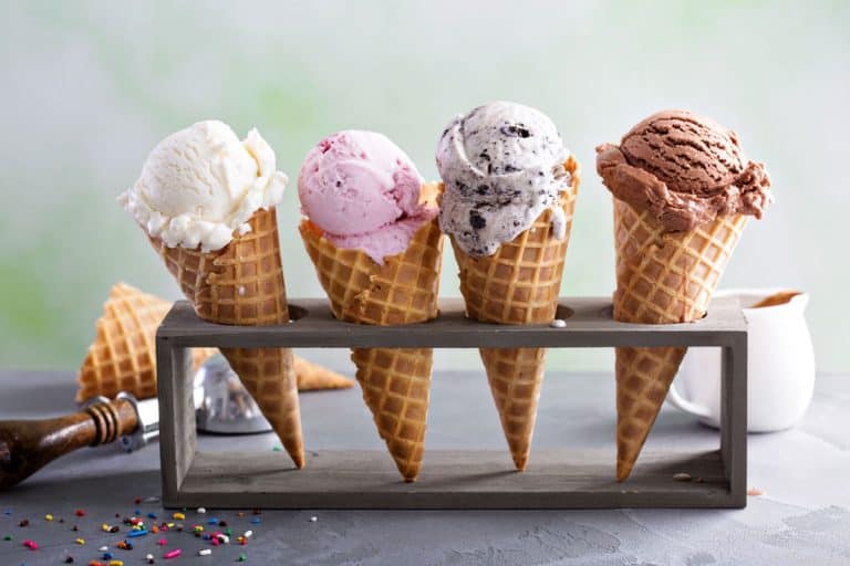 Variety of ice cream scoops in cones with chocolate, vanilla and strawberry, How Long Does Ice Cream Take To Freeze Or Melt?