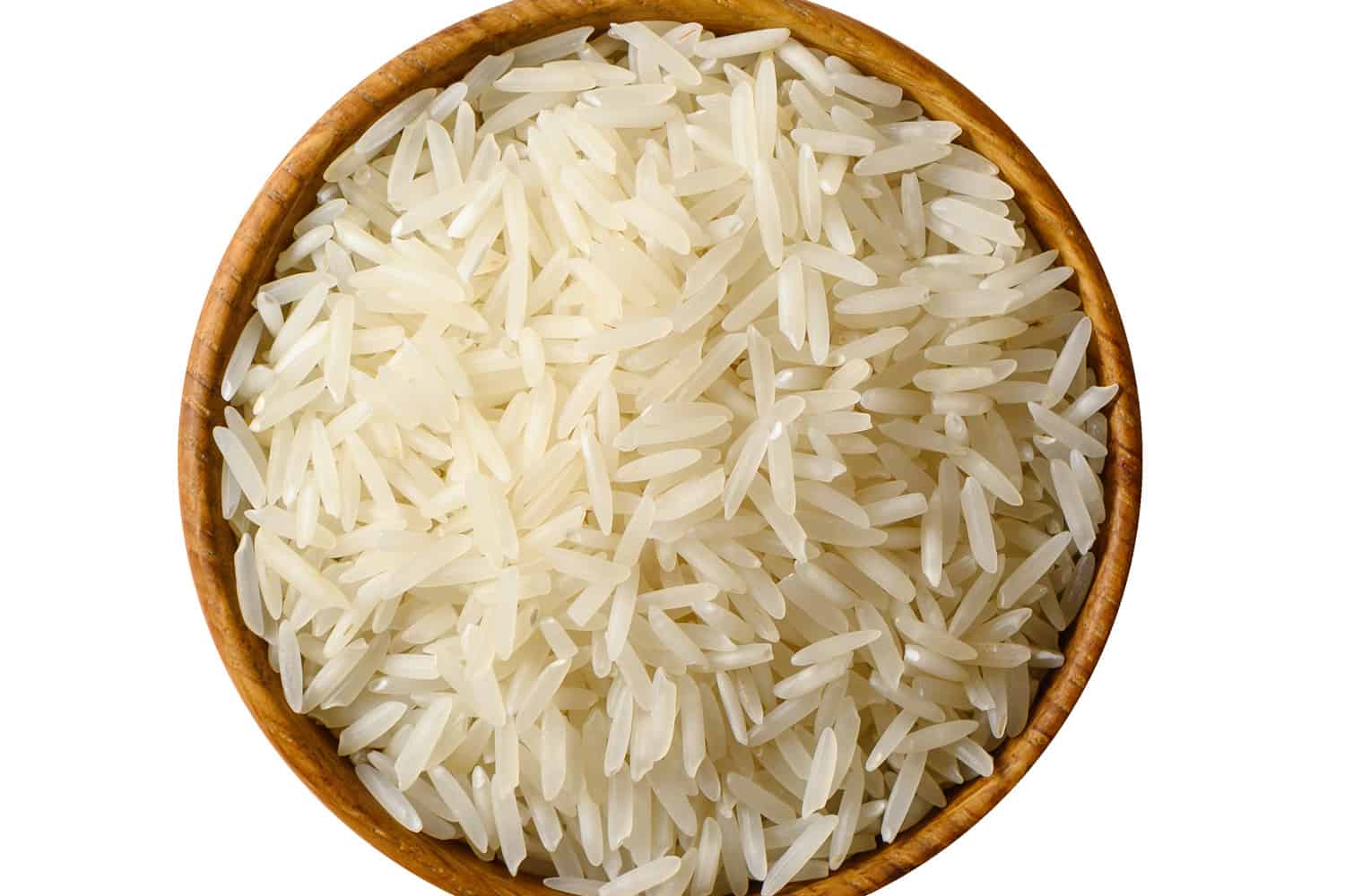 Wooden bowl with white long rice basmati isolated on white background.