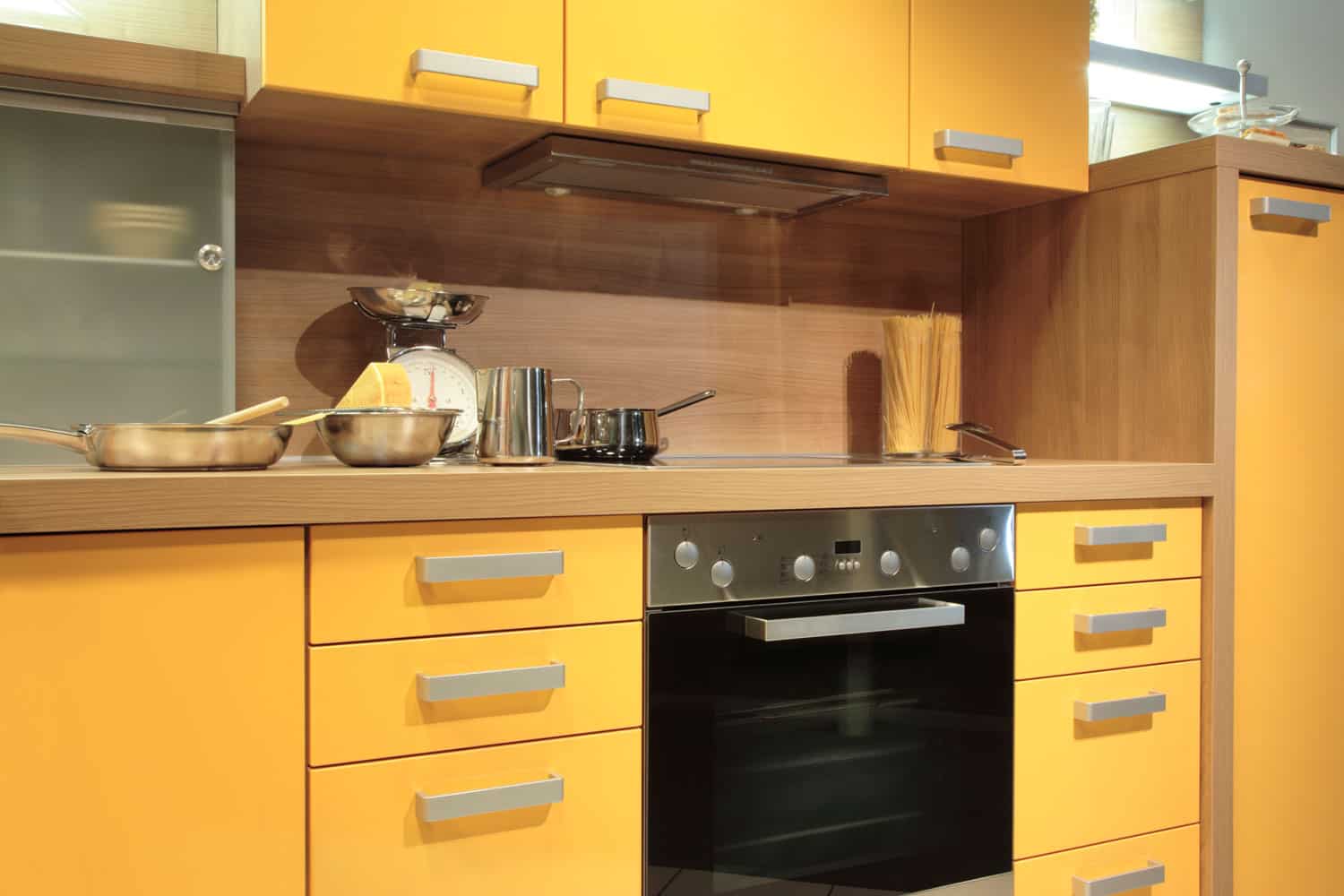 Yellow Cabinets combination with black appliances