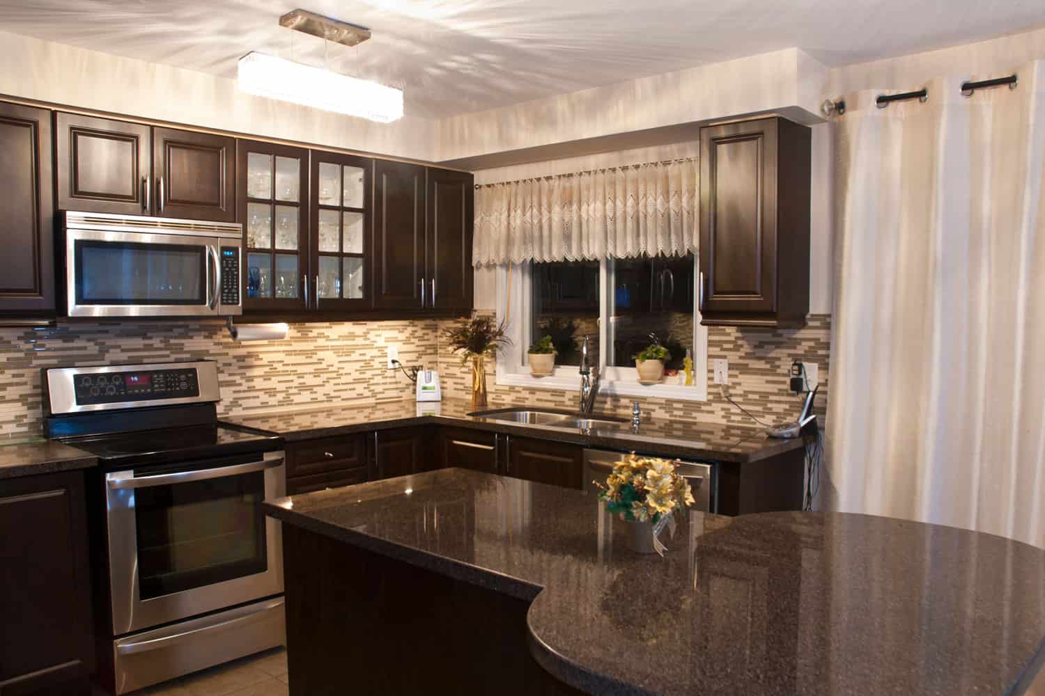 Dark choco luxury type kitchen cabinet with modern kitchen design