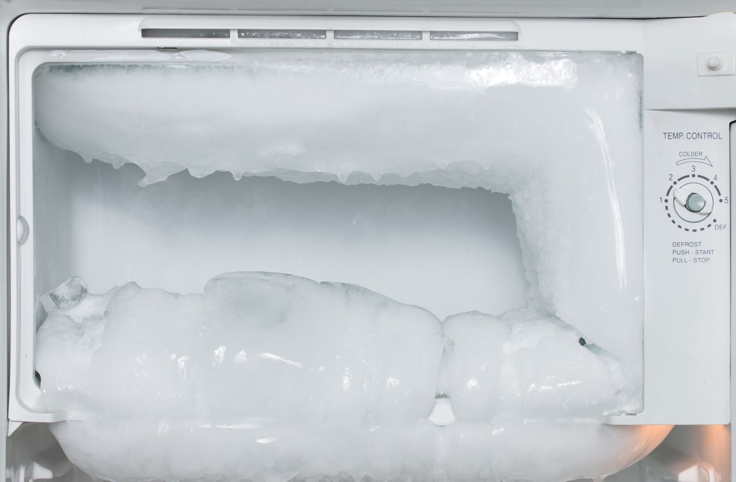 white freezer refrigerator is opened