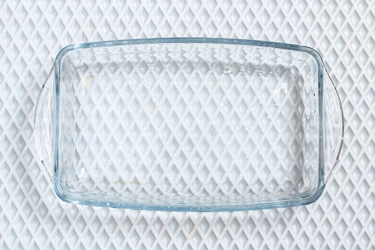 A baking dish cleaned from a thick layer of carbon