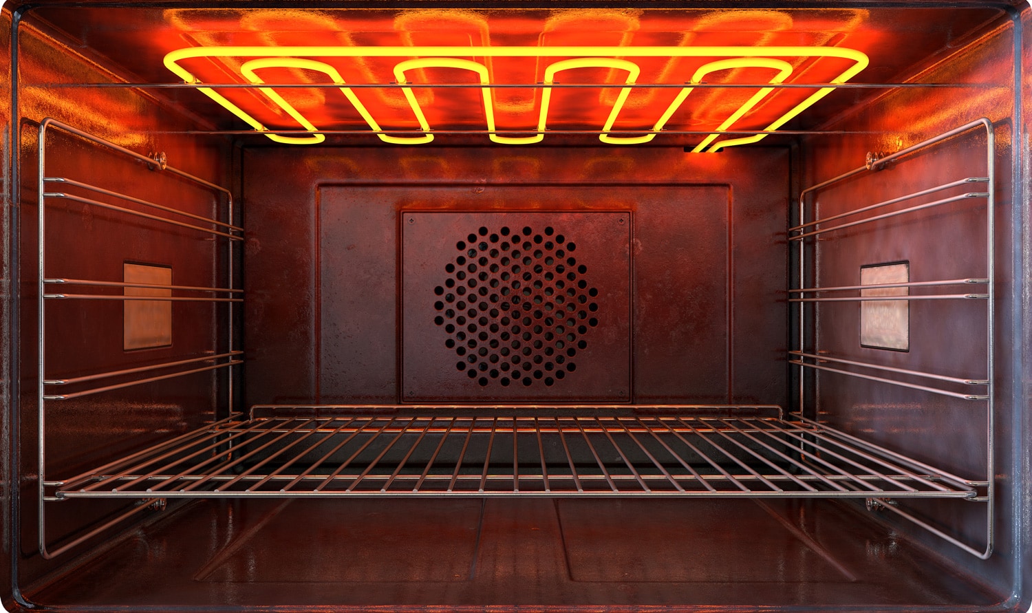 An upclose view through the front of the inside of an empty hot operational household oven with a glowing element and metal rack