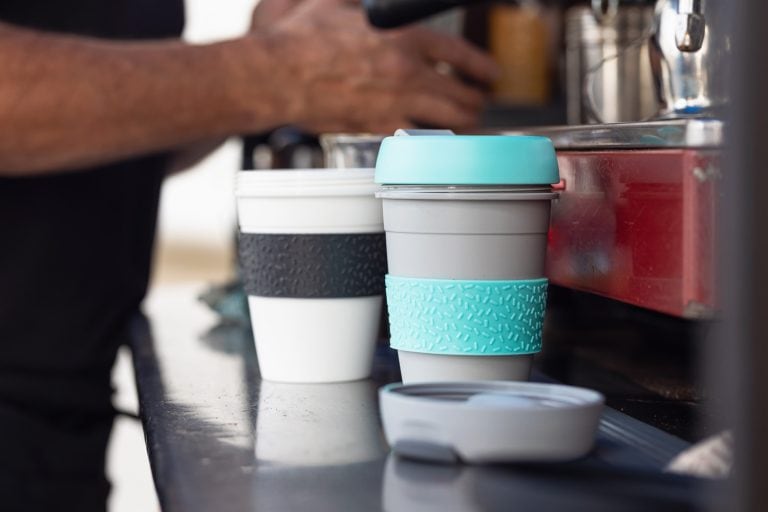 Barista At Mobile Coffee Van Using Reusable Coffee Cups - How Tall Of A Cup Can Fit Under A Keurig