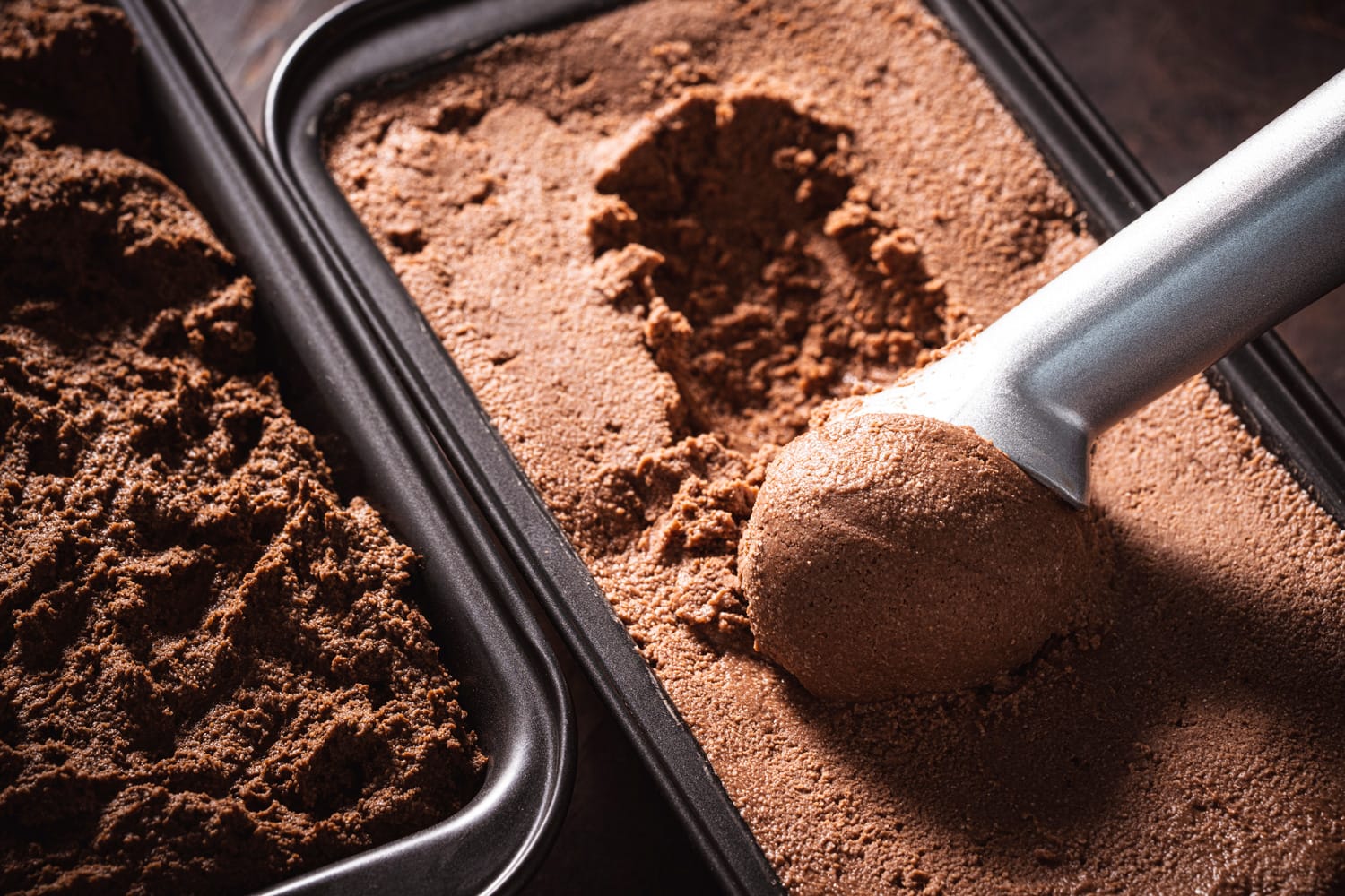 Chocolate ice cream scoop ball serving ice-cream macro close-up detail