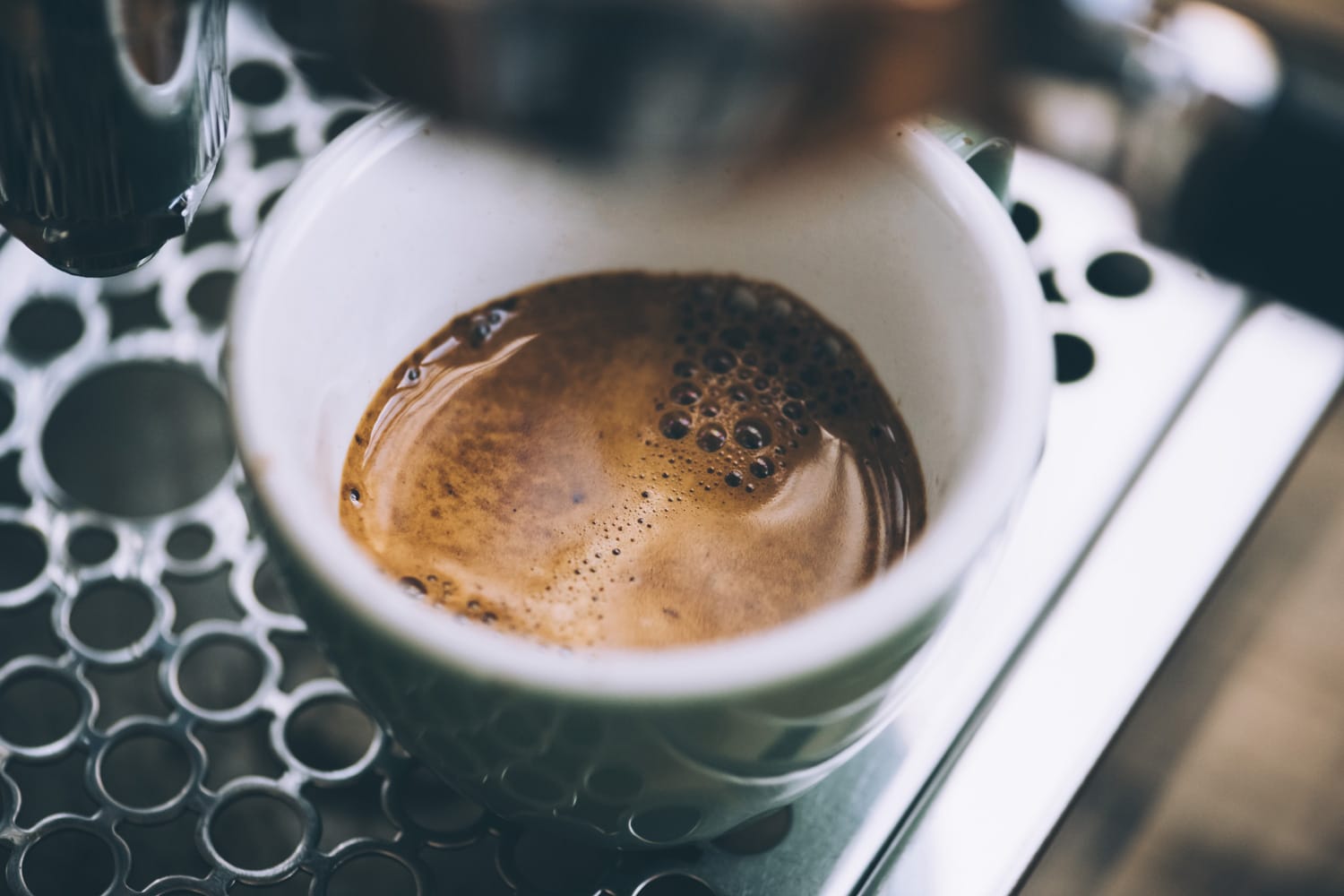 Delicious morning fresh espresso coffee with a thick crema