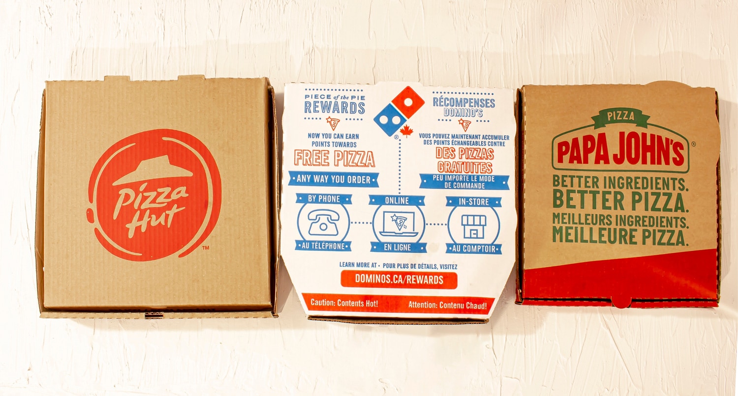 Top view of Pizza boxes. Pizza hut, Domino's, Papa John's.