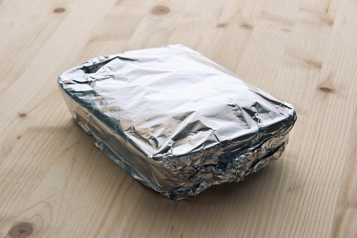 Tray with aluminum foil.