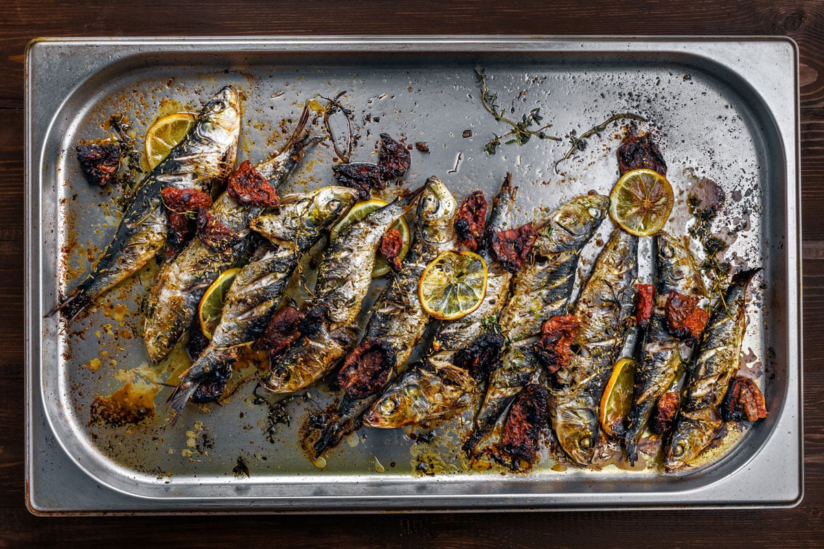 elicious baked sardines on a baking sheet