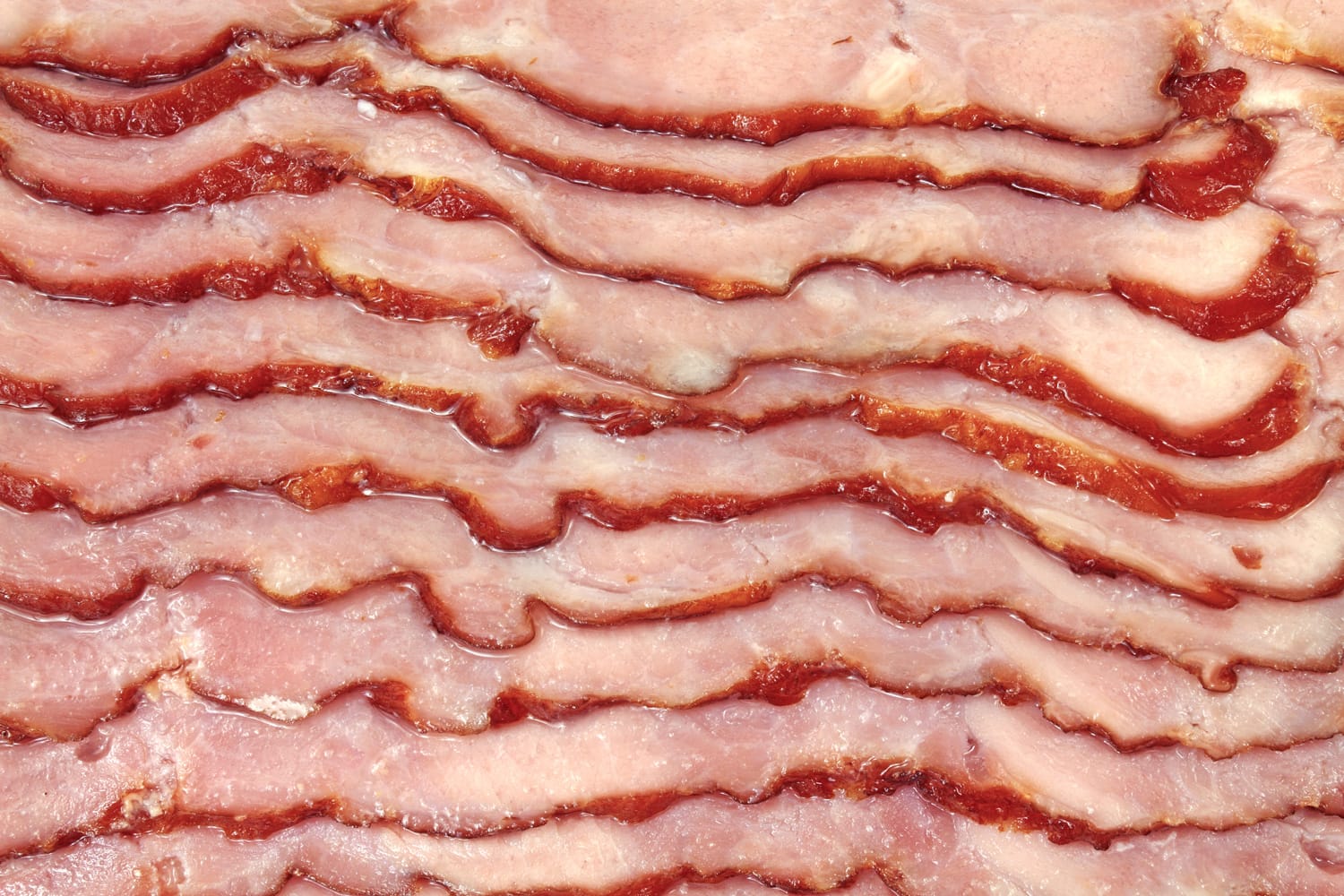 A very close view of sliced turkey bacon.