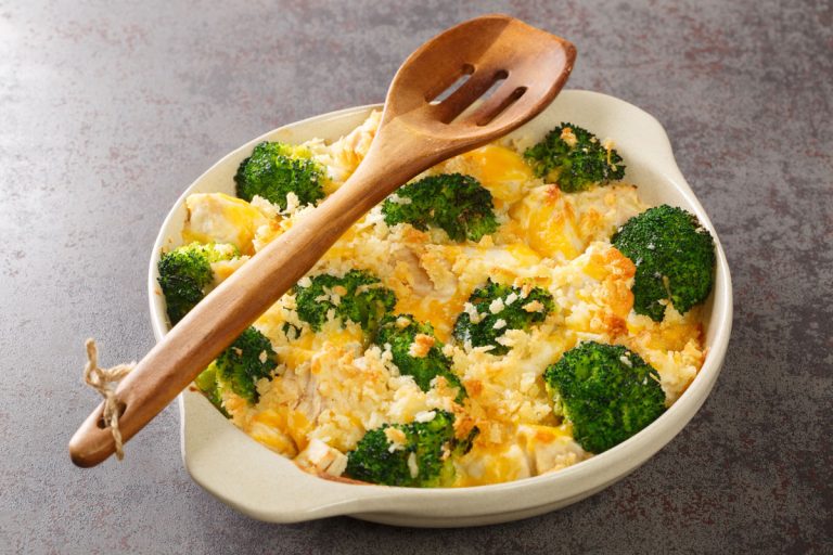 Broccoli Chicken divan is a creamy casserole topped with crispy buttered breadcrumbs close up in the dish on the old table, What Sides Go With Smothered Chicken? [14 Delicious Dishes To Try]