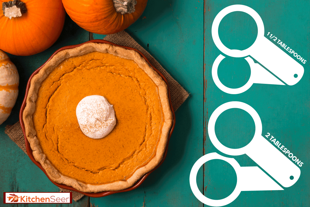 Top view of delicious pumpkin pie on a blue table, How Much Pumpkin Spice To Add To Cake, Pie, Or Pancake