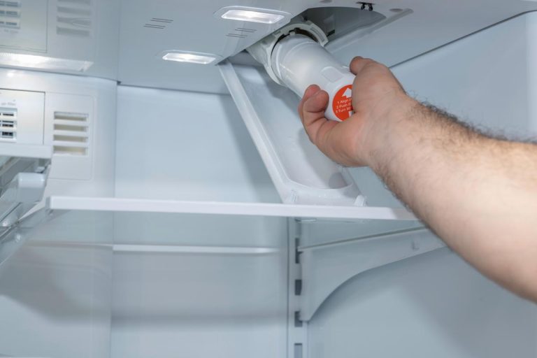 Installing of a fridge water filter on a modern appliance, Does Fridge Filter Remove Chlorine? [Benefits of Filtration Explained]