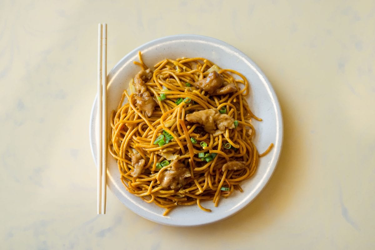 Lo Mein noodles with chicken and chop sticks