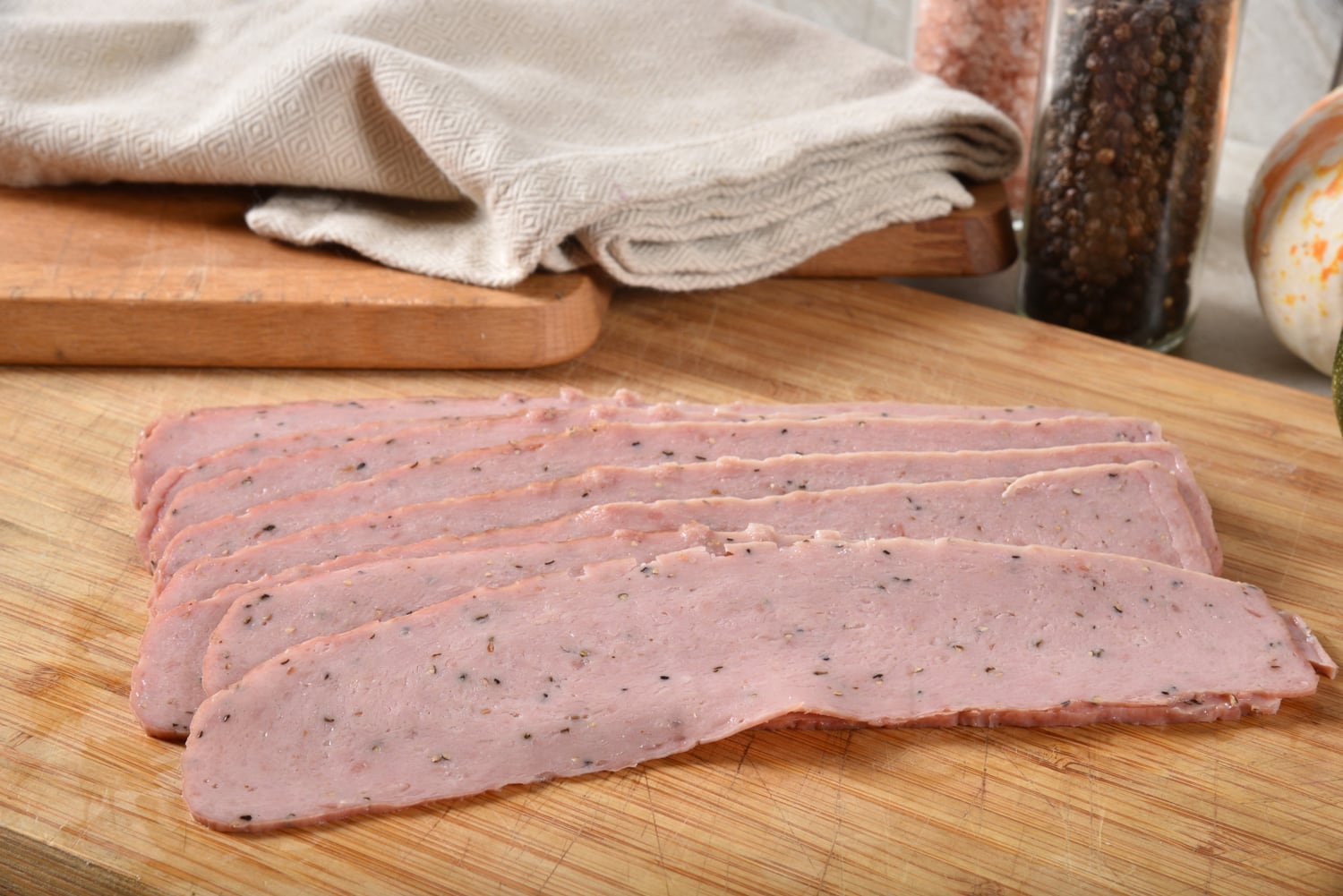 Natural, healthy turkey bacon slices on a cutting board