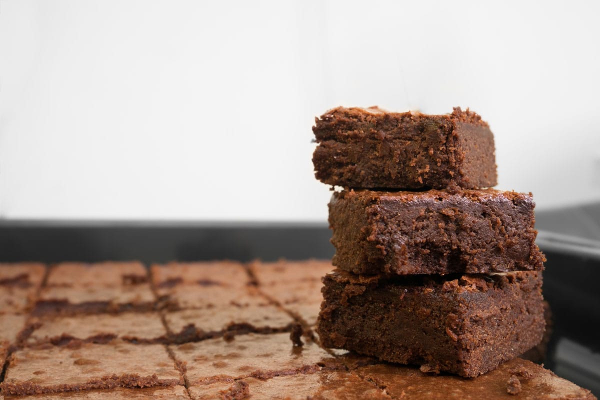 Stack of sticky brown chocolate brownies