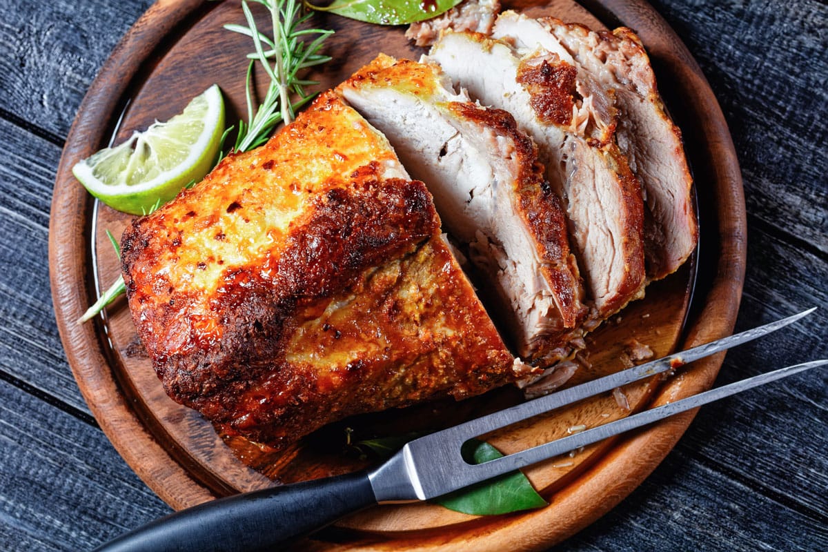 Sunday roasted pork tenderloin, juicy and succulent oven-baked piece of meat rubbed with mustard and spices