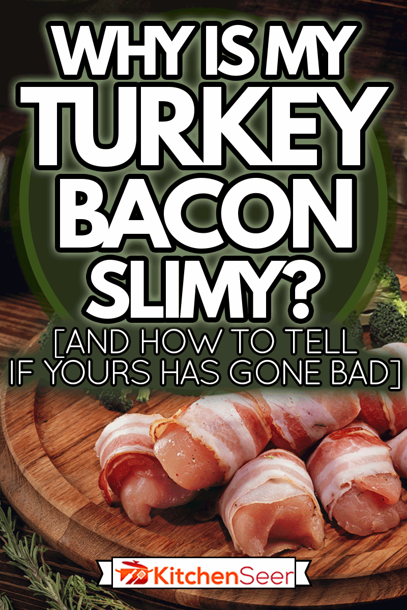 Raw rolls of turkey bacon on a wooden plate, Why Is My Turkey Bacon Slimy? [And How To Tell If Yours Has Gone Bad]