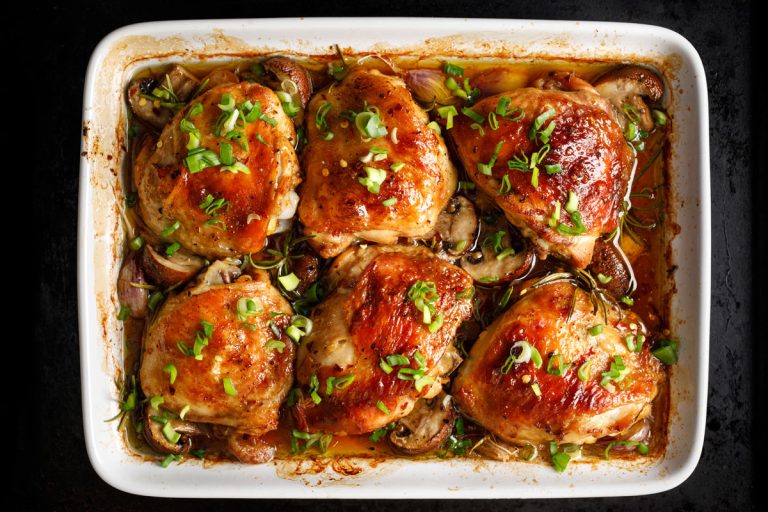 Baking chicken breasts garnished with chives, Should You Cover Chicken Breasts When Baking?