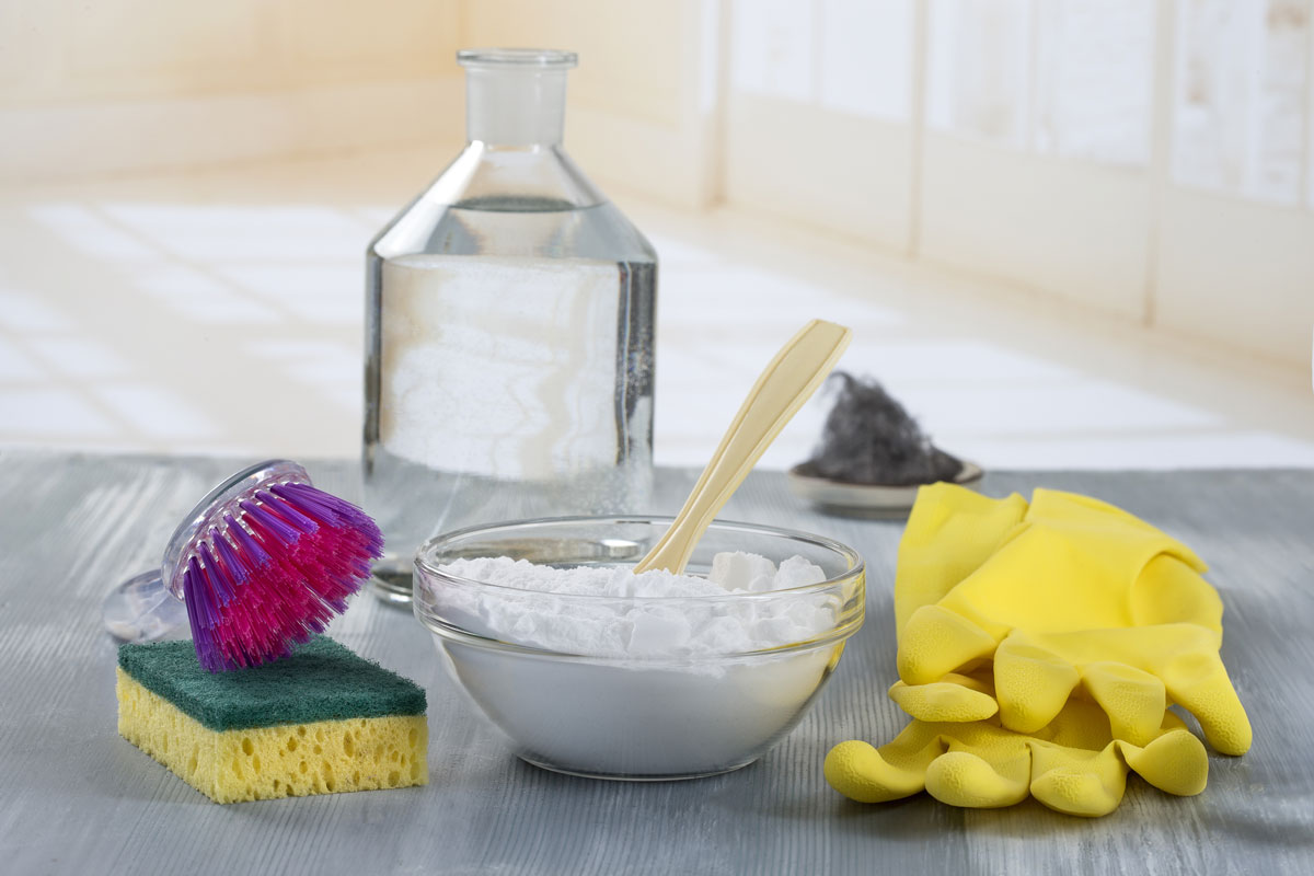 Cleaning materials for removing hard stains, oils or smell