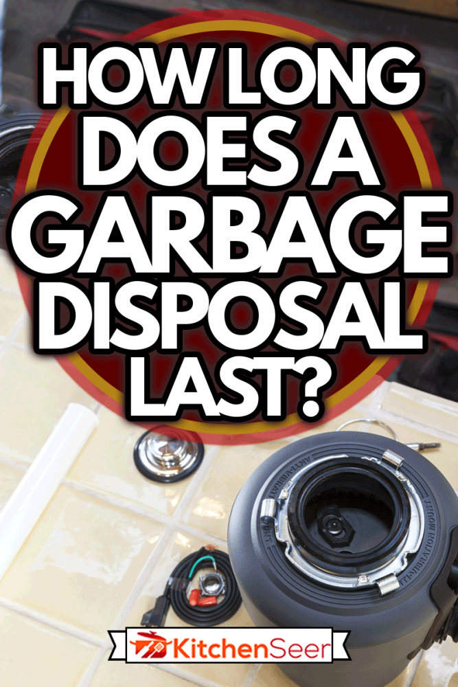 Man installing garbage disposal in home, How Long Does a Garbage Disposal Last?