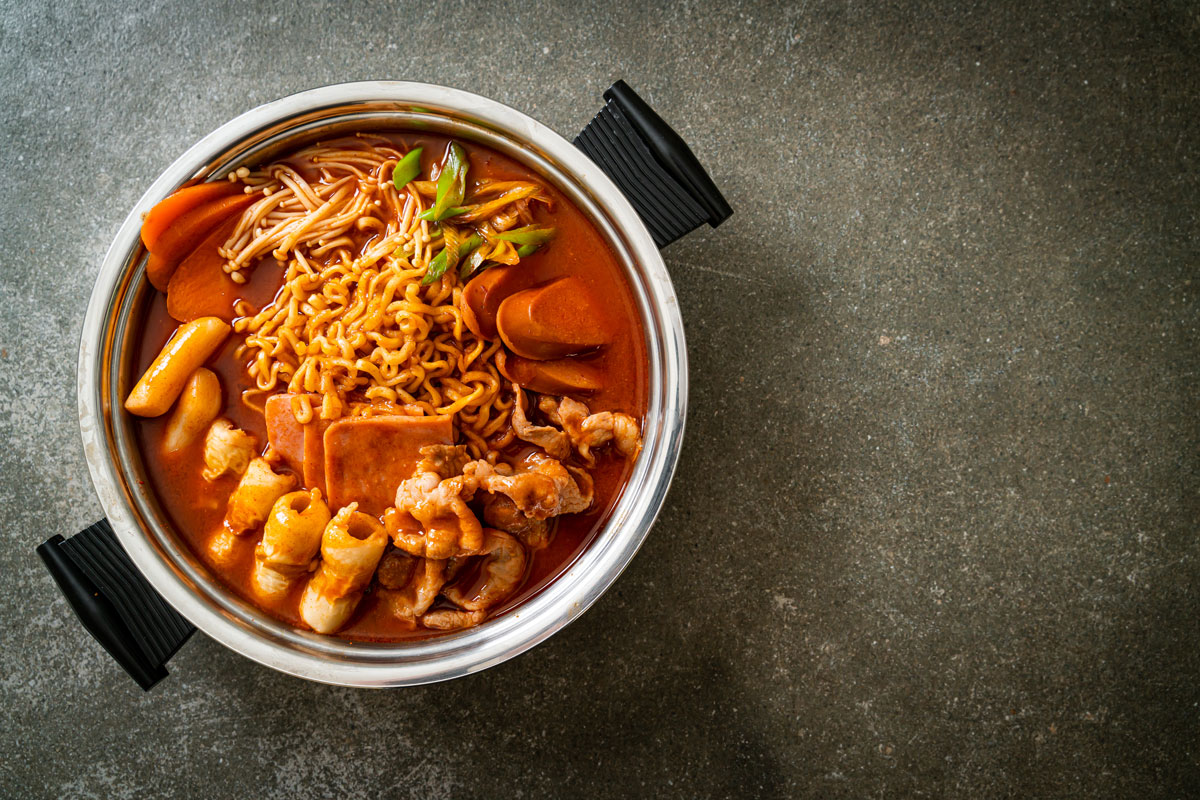 It is loaded with Kimchi, spam, sausages, ramen noodles and much more - popular Korean hot pot food style