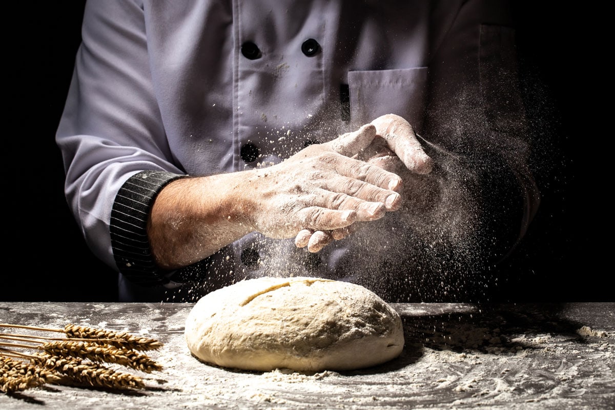 Kneading dough for baking bread or pizza
