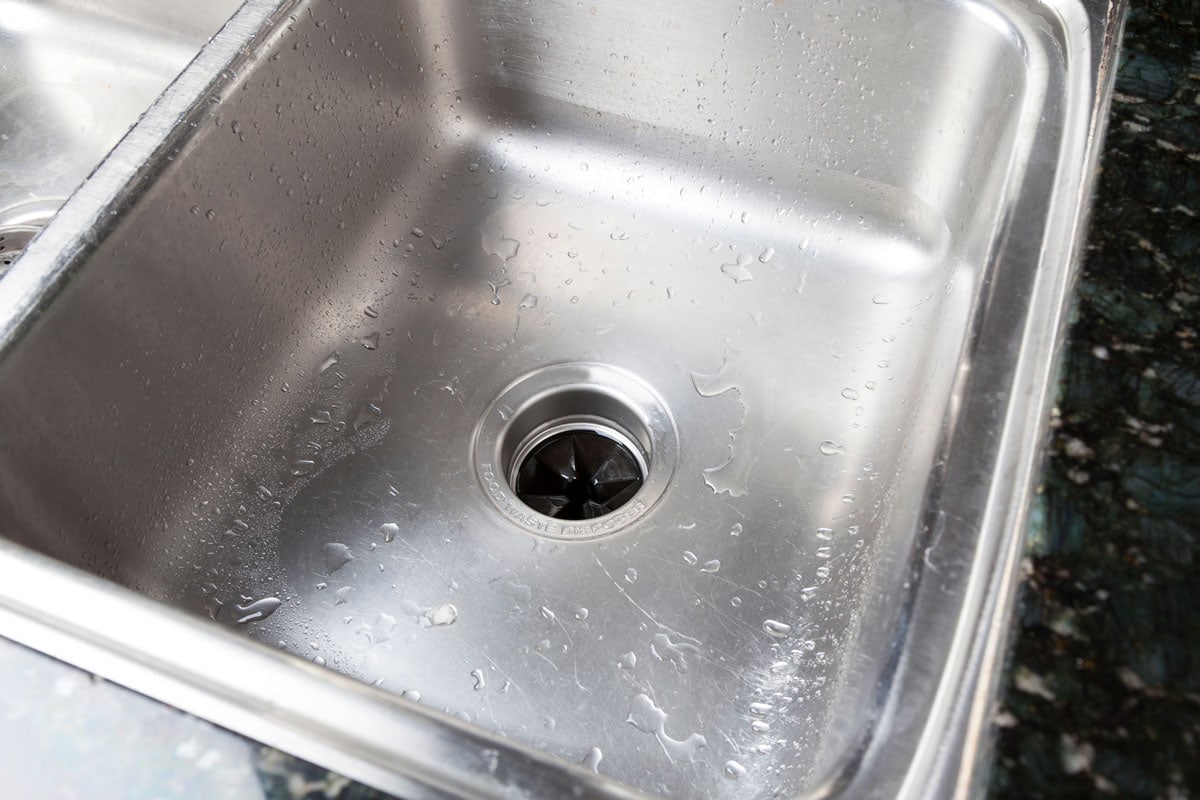 Stainless steal kitchen sink with water drops