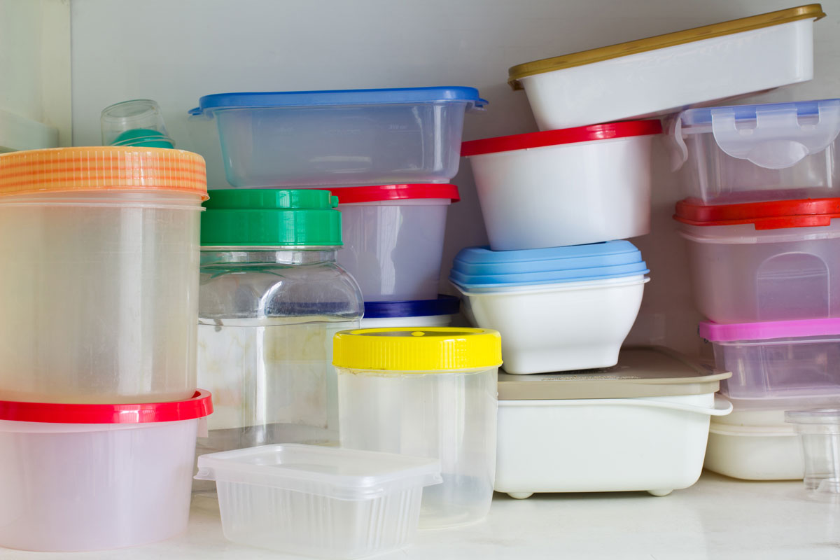 Tupperware containers stored at the corner of a room