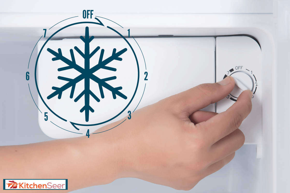 Man changing the refrigerator temperature, What Is The Coldest Setting On A Fridge?