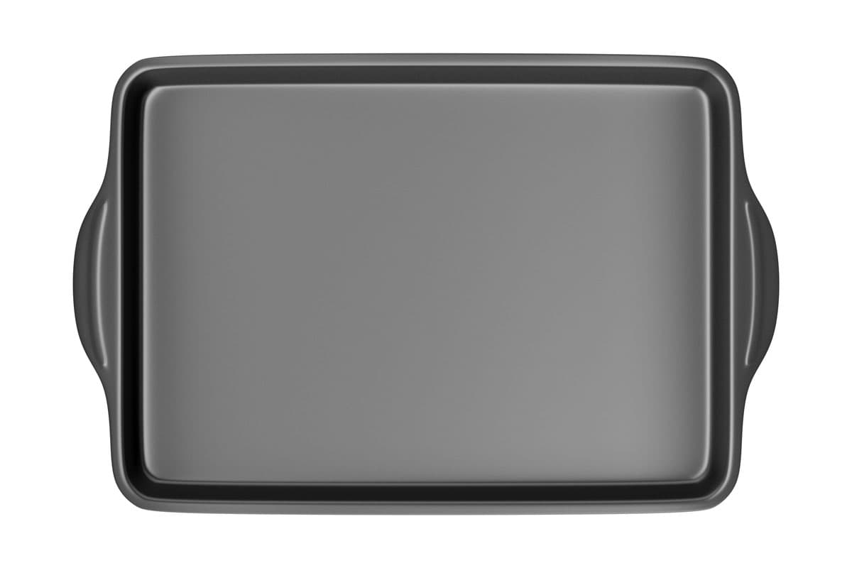 A black baking pan on a white backgound